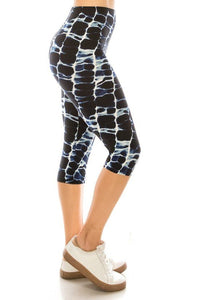 Abstract Print, High Waisted Capri Leggings In A Fitted Style With An Elastic Waistband.