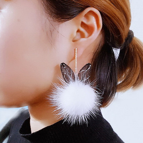 Fur ball bunny ears earrings
